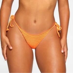 SKIMS neon orange knit swim tie bottoms